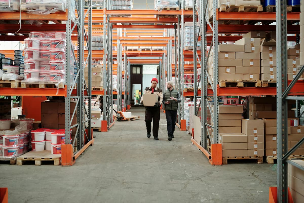Warehouse logistics operations with organised shelving and inventory — supply chain management